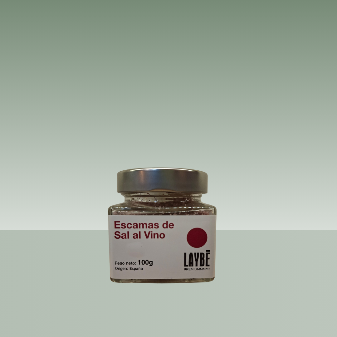 Tarro de escamas de sal al vino Laybé de 100 g, con sal rosada visible y etiqueta blanca, ideal para aportar un toque gourmet a tus platos