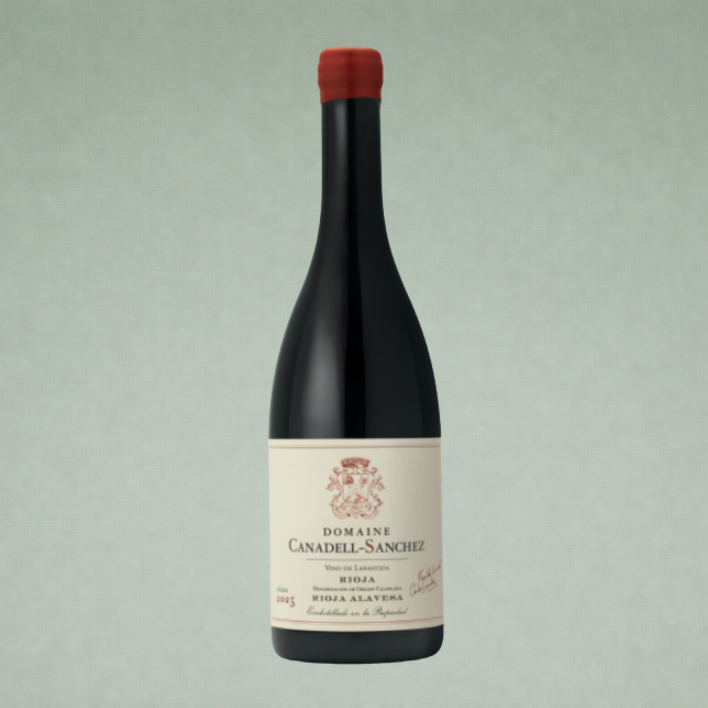 Vino tinto Domaine Canadell Sanchez Rioja botella sobre fondo verde