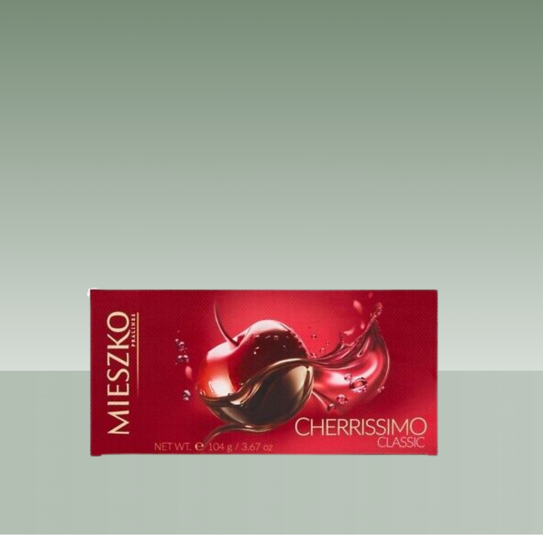 Tableta de chocolate Mieszko Cherrissimo Classic, con relleno de cereza en licor, presentada en envoltorio rojo intenso con ilustración de cereza y chocolate líquido sobre fondo neutro.