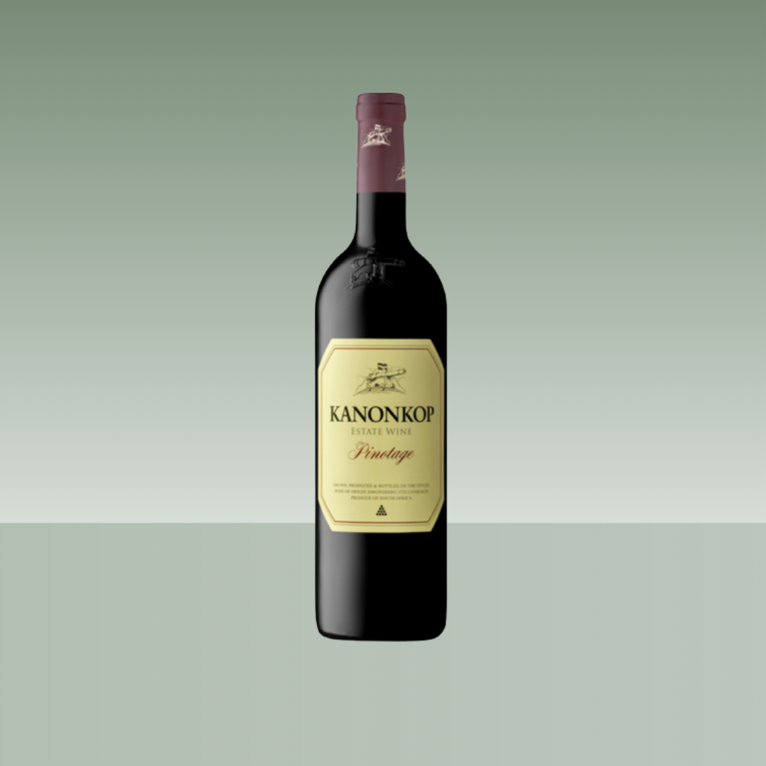 Botella de vino tinto Kanonkop Estate Pinotage, con etiqueta clásica en tonos crema y dorado, botella oscura y cápsula granate, presentada sobre fondo neutro.