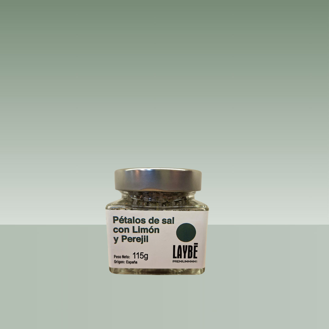 Tarro de pétalos de sal Laybé con limón y perejil, formato cuadrado de 100 g, ideal para realzar pescados, ensaladas y platos mediterráneos