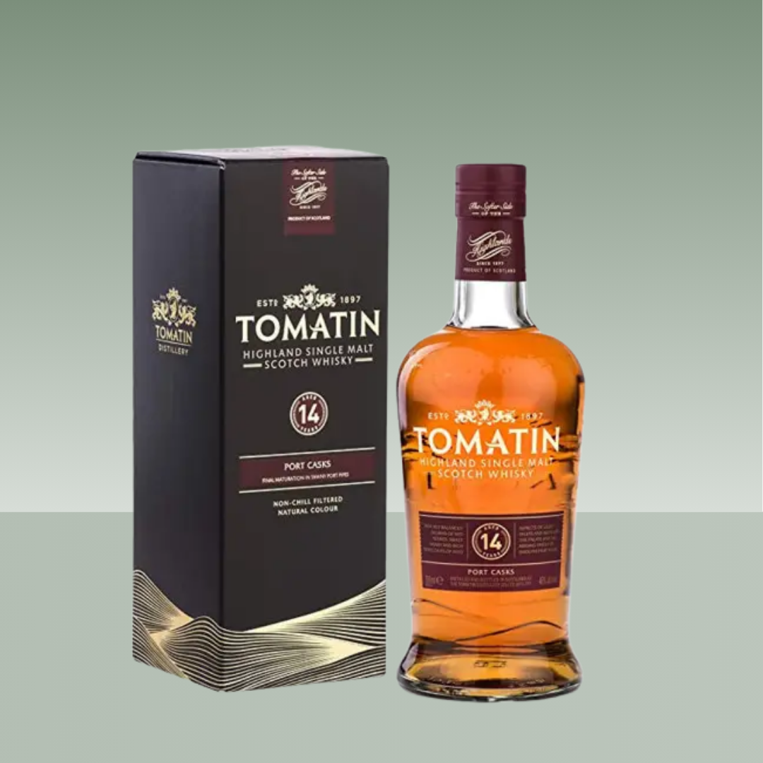 Botella de whisky Tomatin 14 Años Highland Single Malt junto a su estuche, mostrando el diseño elegante del packaging y el color ámbar del whisky