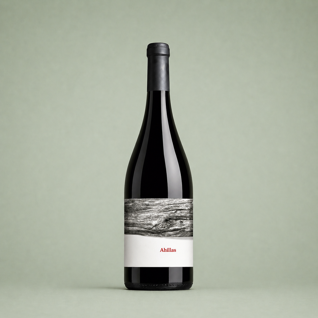 Botella de vino tinto Ahillas con etiqueta minimalista de textura de madera.