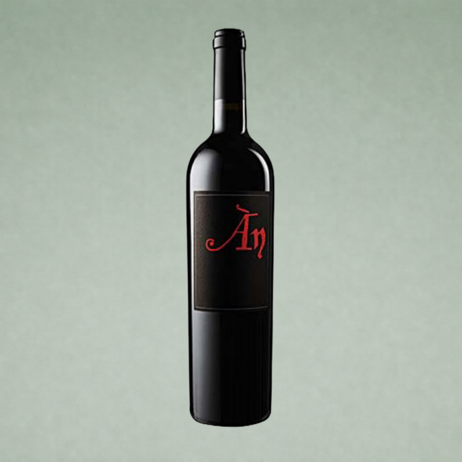 Vino tinto Ànima Negra botella sobre fondo verde