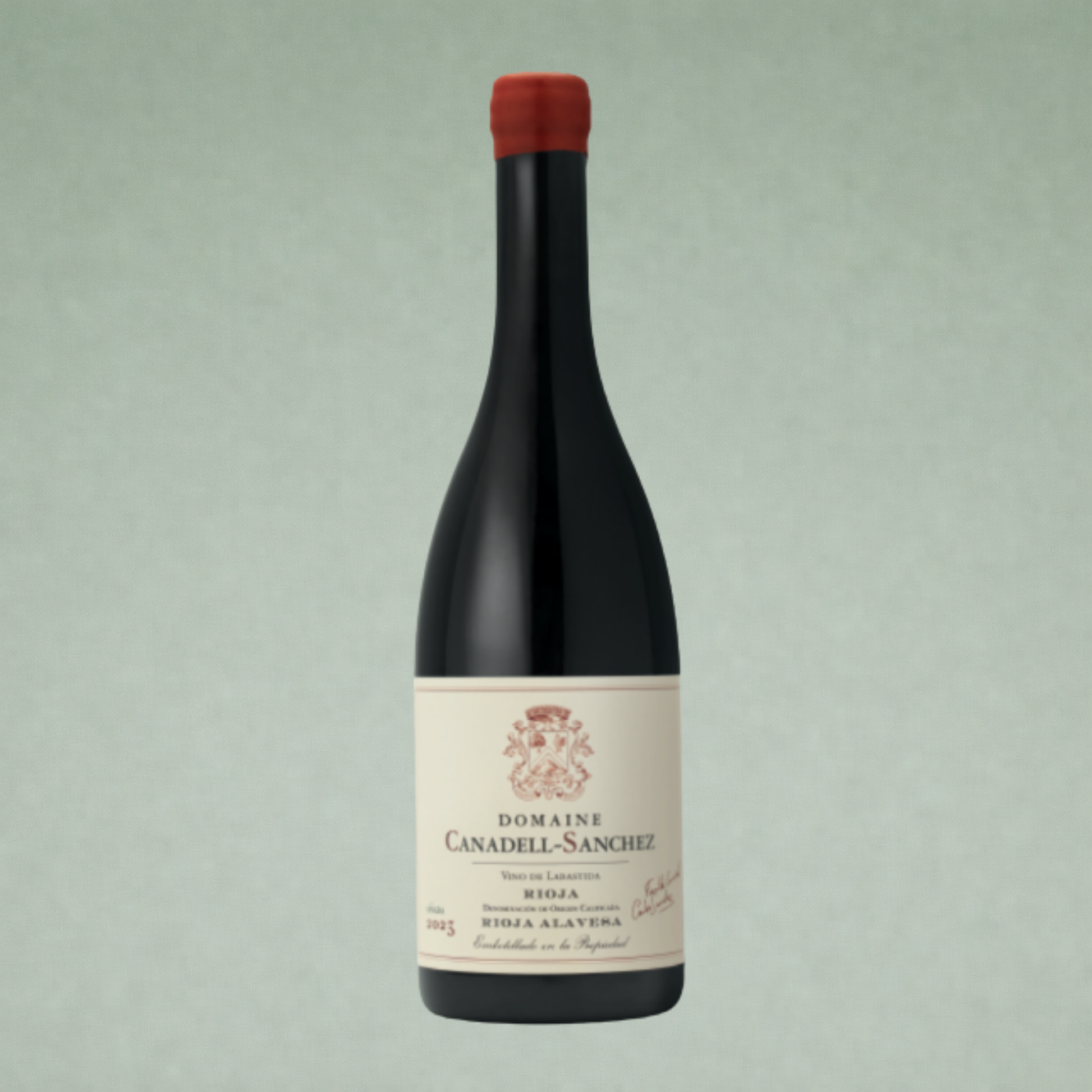 Vino tinto Domaine Canadell Sanchez Rioja botella sobre fondo verde