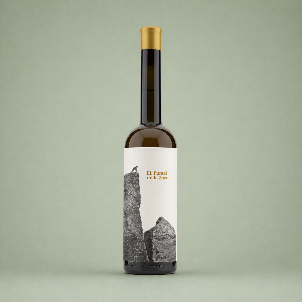 Botella de vino blanco DULCE  El Puntal de la Zorra con etiqueta ilustrada de formaciones rocosas.